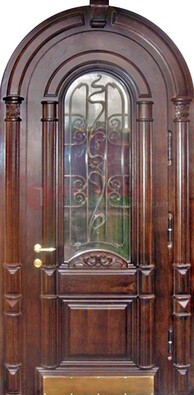 Арочная металлическая дверь массив со стеклом и ковкой ДА-50 в Черноголовке